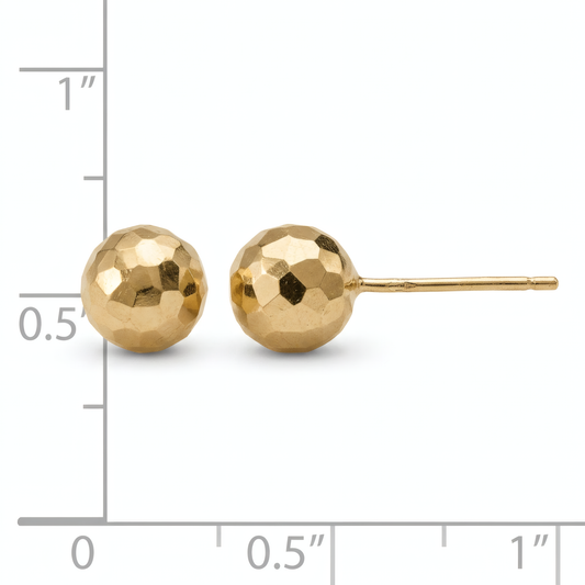 7mm faceted 14k yellow gold ball stud earrings, front and side view on a white background with an inch scale.