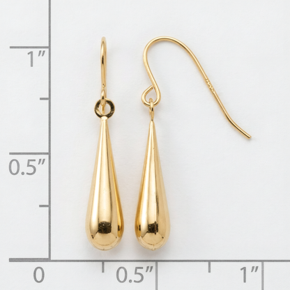 Polished 14k yellow gold teardrop dangle earrings on French hooks, on a white background with an inch scale.