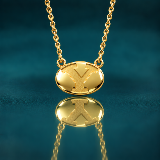 BYU stretch-Y logo in 10k gold strung on on 18" 10k gold chain.