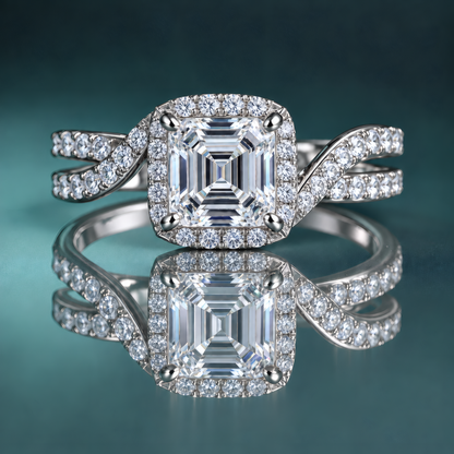 White gold asscher diamond halo engagement ring with unique diamond-accented split shank.