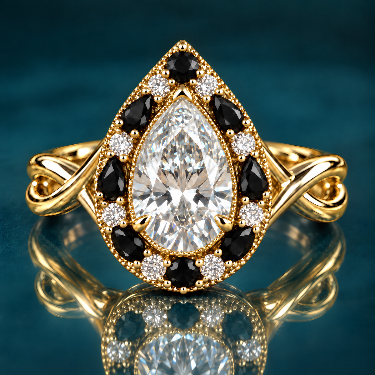 Kai engagement ring in yellow gold with a pear-shaped diamond in a milgrain halo of black pear-shaped stones and round diamonds on a twisted band