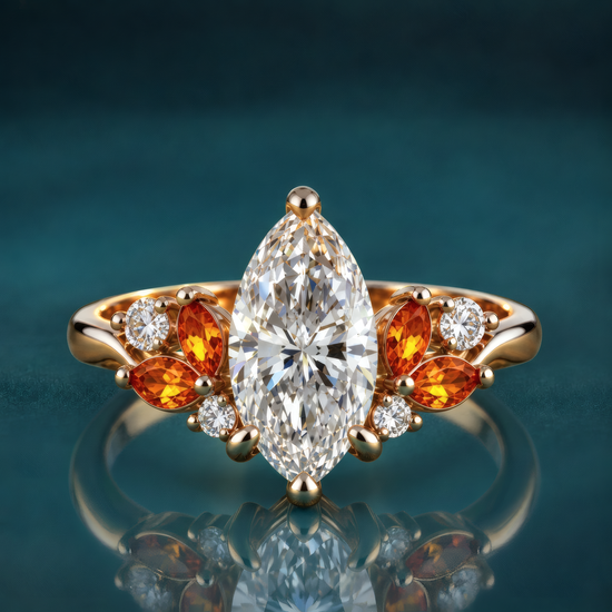 Marlo engagement ring in yellow gold featuring a marquise diamond surrounded by flame-orange marquise leaves and round diamond accents