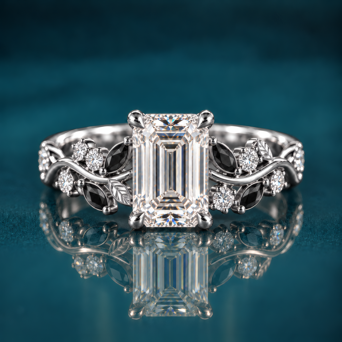 Noctis pairs white gold with an emerald-cut diamond with a winding vine band set with deep black marquise accents and sparkling round diamonds, a striking contrast of light and shadow.