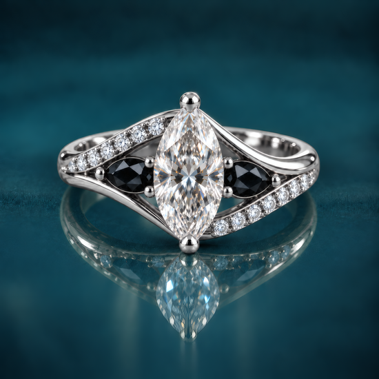 Nyra engagement ring in white gold featuring a marquise diamond in an open split pave band with black pear-shaped accents