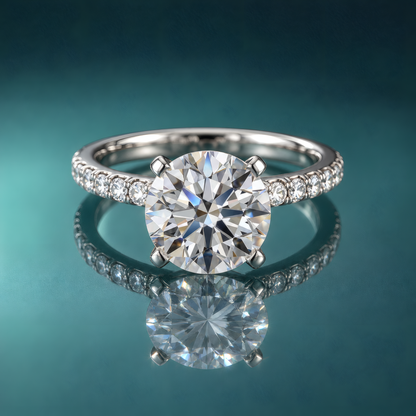 Gold solitaire engagement ring with side diamonds