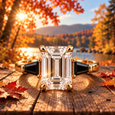 Tavi engagement ring with emerald-cut diamond and tapered black baguette side stones