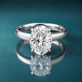white gold oval solitaire engagement ring claw prongs