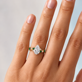 Gold engagement ring on woman&